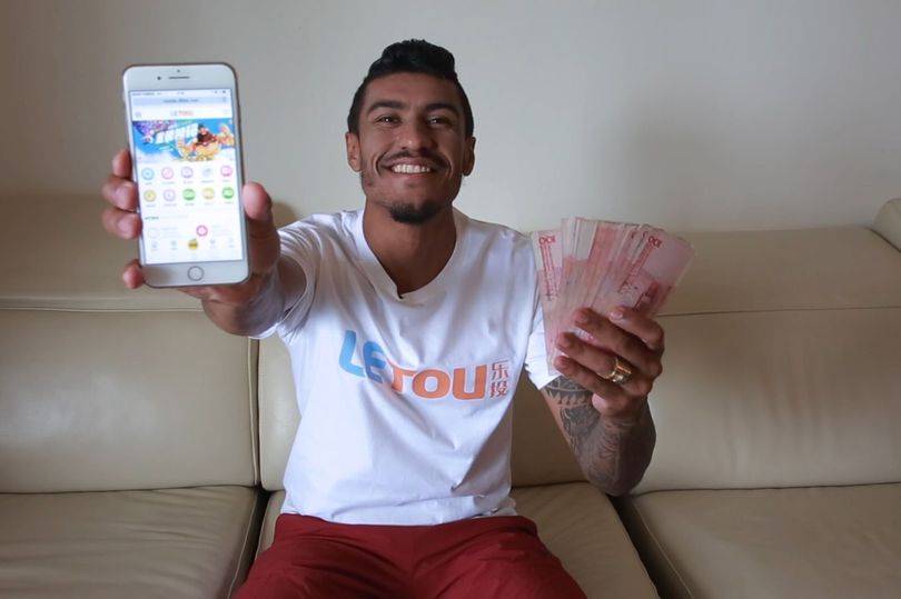 Paulinho risks deportation from China after posing alongside a porn star in a gambling advert