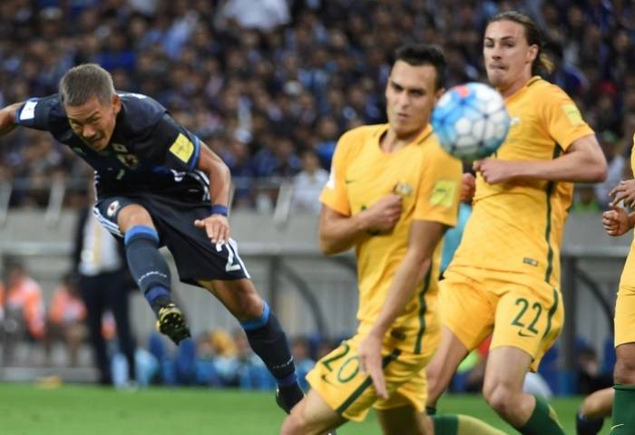 Japan secure World Cup berth with 2-0 win over Australia