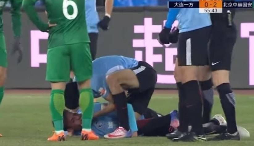 Dalian Yifang midfielder Nico Gaitan suffers horror injury after collison with Beijing Guoan player