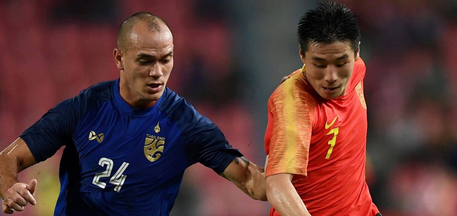 Wu Lei scores a brace as China beat Thailand in a heavy downpour