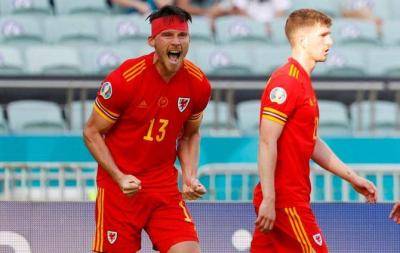 Kieffer Moore’s header earned Wales a point in a 1-1 draw with Switzerland;Finland beats Denmark 1-0 after Pohjanpalo goal