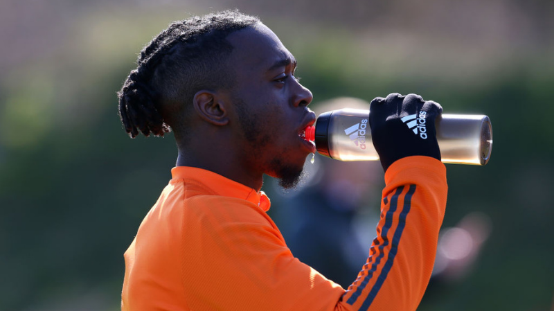 Aaron Wan-Bissaka of Manchester United has a drink during a first team training session at Aon Training Complex on April 2, 2021 in Manchester, England.
