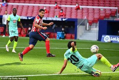 Luis Suarez puts Barcelona snub behind him as tears become broad grins with spectacular brace in debut for Atletico Madrid